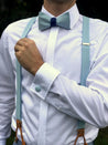 hellblaue hosenträger mit echtleder und manschettenknöpfe und fliege auf weißes hemd handgemacht