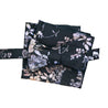 schwarze herrenfliege zum selbstbinden mit blumen und einstecktuch